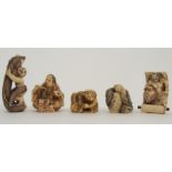 FIVE JAPANESE IVORINE NETSUKE comprising; a man sleeping on a barrel, 4cm high, man eating, 5cm