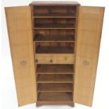 A CUBAN CIGAR CABINET the inlaid doors enclosing eight shelves and two drawers, stamped J. Valle
