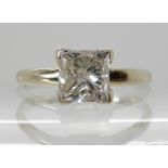 A 14K WHITE GOLD PRINCESS CUT DIAMOND SOLITAIRE RING stamped 585 to the inner shank, princess cut