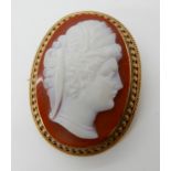 A 15CT GOLD MOUNTED CARNELIAN CAMEO OF A CLASSICAL MAIDEN approx dimensions 3.5cm x 2.7cm, weight