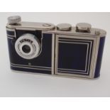 A 1950'S PETIE VANITY CAMERA with marbled blue effect body, camera section, lipstick holder and