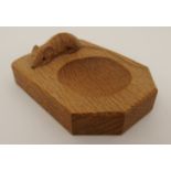 A ROBERT MOUSEMAN THOMPSON OF KILBURN ASHTRAY with carved mouse signature, 10 x 7.5cm Condition