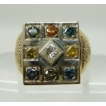 A 9CT GOLD RAINBOW DIAMOND RING set with a central princess cut of estimated approx 0.35cts,