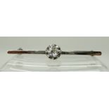 AN 18CT WHITE GOLD DIAMOND BAR BROOCH set with an estimated approx 0.40ct old cut diamond, length of