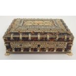 A VIZAGAPATAM JEWELLERY BOX the hinged cover with lion cartouche within pierced foliate bands, the