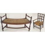 AN ARTS AND CRAFTS RUSH SEATED ARMCHAIR with trellis back above curved arms and bar stretchers, 65cm