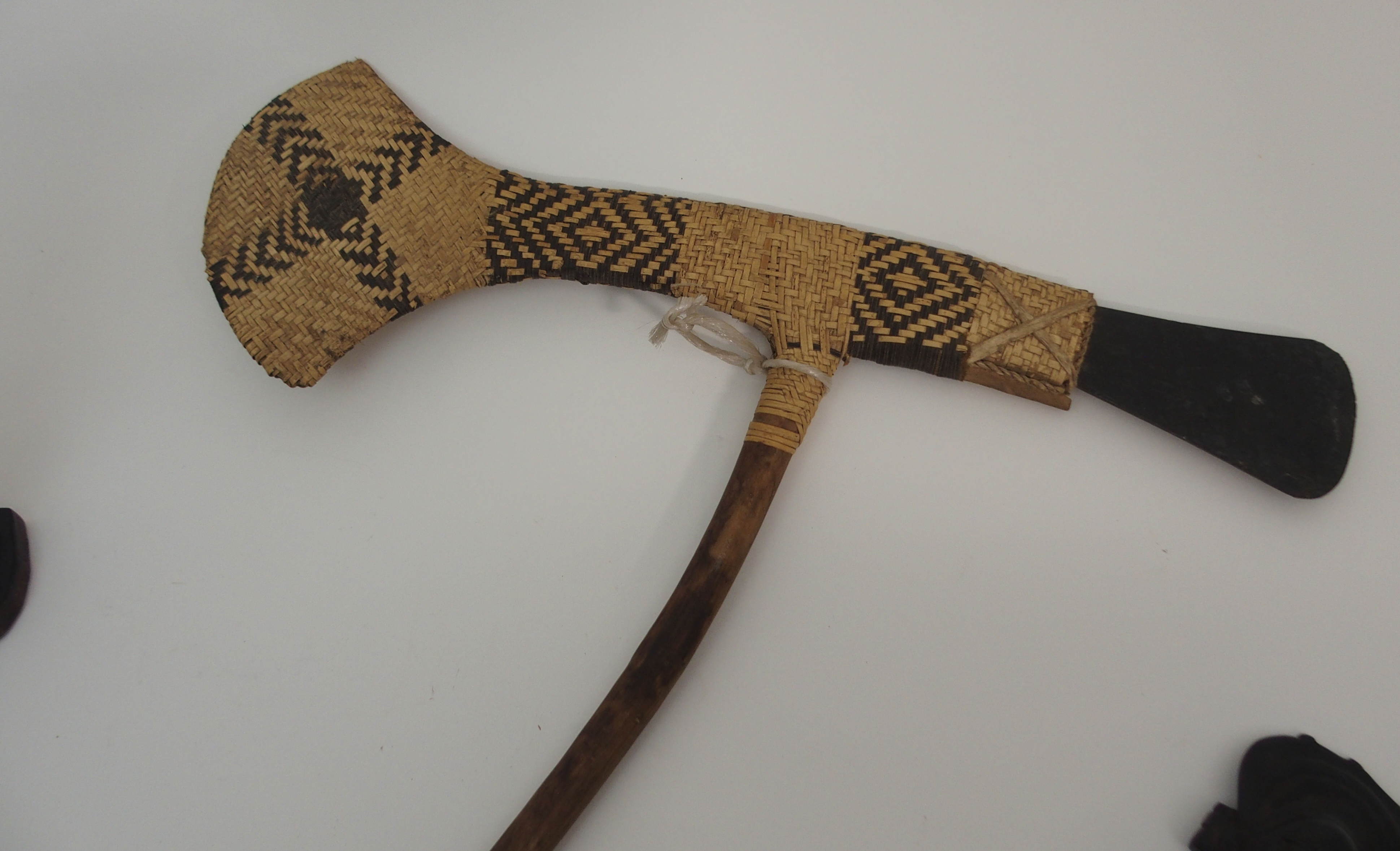 A GROUP OF AFRICAN TRIBAL ITEMS comprising; a Papua New Guinea ceremonial slate and wicker axe, 57cm - Image 3 of 5