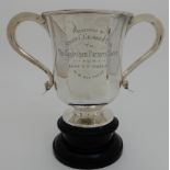 A SILVER TROPHY CUP ON STAND by Martin Hall & Company, Sheffield 1913, of waisted cylindrical form