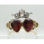 AN EARLY 19TH CENTURY GARNET AND DIAMOND RING of crowned double heart design, with scallop shell