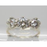 AN 18CT GOLD THREE STONE DIAMOND RING set with estimated approx 1.30cts combined of brilliant cut