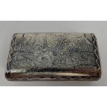 A RUSSIAN SILVER NIELLO SNUFF BOX possibly marked for Moscow & 84, of rounded rectangular form,