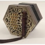 A HEXAGONAL THIRTY-NINE BUTTON LACHENAL & CO CONCERTINA with white-metal pierced ends in original