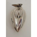 A CHINESE SILVER FRUIT SHAPED SANDER modelled with detachable leaf finial above a fluted body