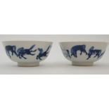 A PAIR OF CHINESE BLUE AND WHITE BOWLS painted with The Eight Horses of Wang Mu, bearing Kangxi
