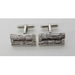 A PAIR OF WHITE METAL DIAMOND SET CUFFLINKS set with estimated approx 0.42cts of brilliant cut