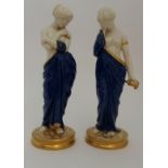 A PAIR OF ROYAL WORCESTER FIGURES JOY AND SORROW modelled by James Hadley, the blue robed maidens