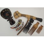 A GROUP OF AFRICAN TRIBAL ITEMS comprising; a Papua New Guinea ceremonial slate and wicker axe, 57cm