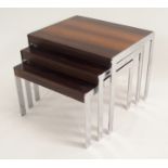 A MERROW ASSOCIATES ROSEWOOD AND CHROME NEST OF THREE TABLES 46cm high x 52cm wide x 46cm deep