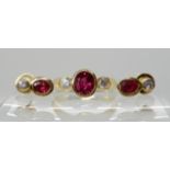 AN 18K GOLD RED GEM AND DIAMOND SUITE comprising of a ring, approx size of red gem 6.5mm x 5.5mm x