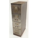 AN EARLY 20TH CENTURY PATENTED BURNISHED STEEL FOUR DRAWER FILING CABINET 132cm high x 37cm wide x
