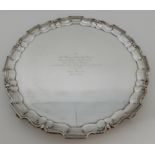 A LARGE SILVER PRESENTATION SALVER by R & W Sorley, Glasgow 1915, of circular form with raised