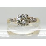 A VINTAGE OLD CUT DIAMOND RING set with an estimated approx 0.40ct old cut diamond in white metal