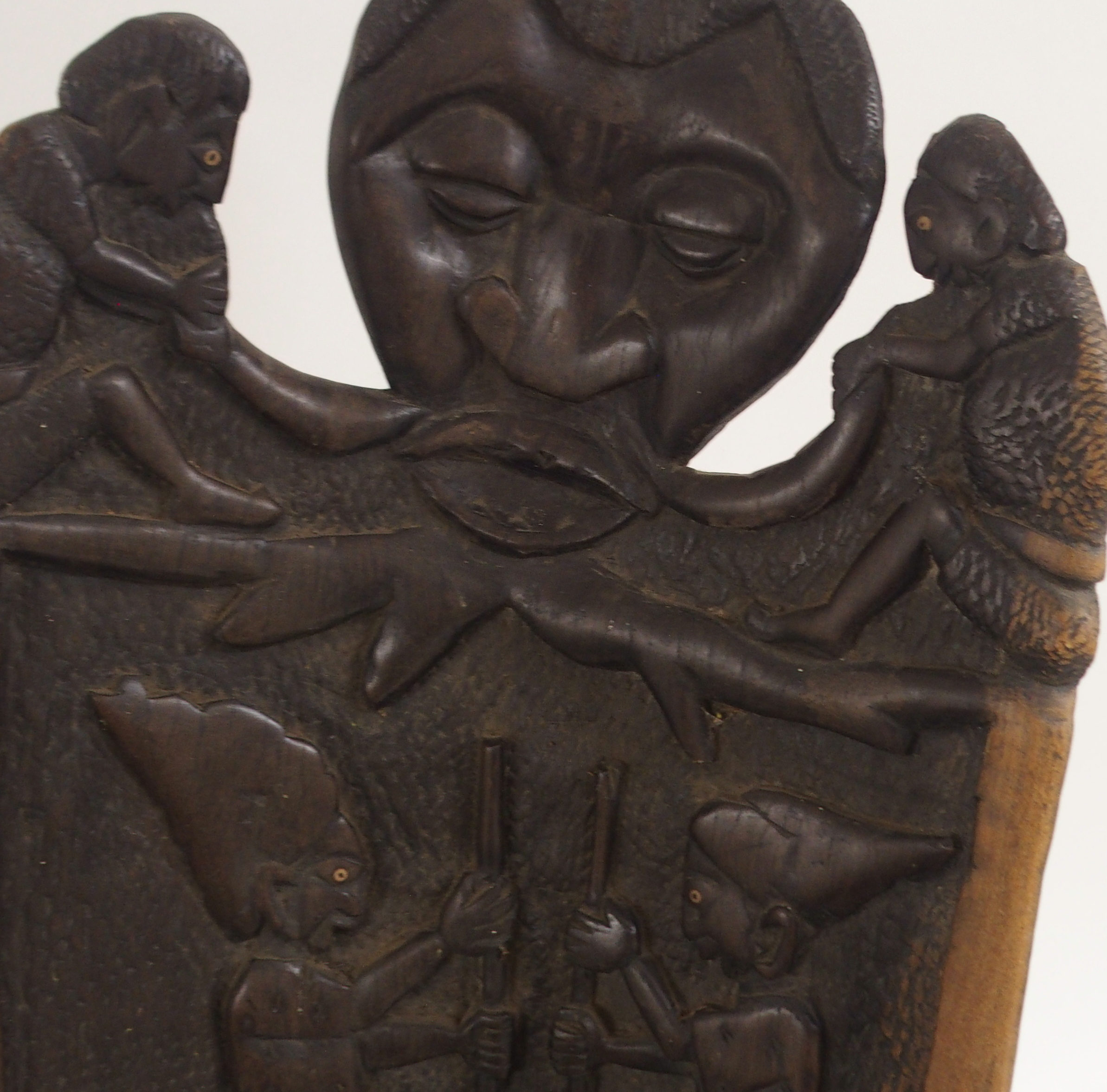 AN AFRICAN CARVED BIRTHING CHAIR the back with face mask flanked by two figures, above two women - Image 4 of 11