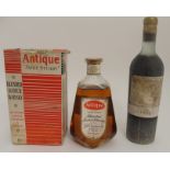 A BOTTLE OF ANTIQUE "JAMES STUART" BLENDED SCOTCH WHISKY 70%, 26.2/3 fl. ozs in carton and a