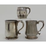 A SMALL SILVER TANKARD by William Darker, London 1789, of baluster form with scrolling handle with