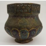 A PERSIAN COPPER AND ENAMEL VASE the pierced octagonal neck with foliate panels above a leaf