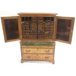 AN EARLY 19TH CENTURY BURR WALNUT AND ROSEWOOD COLLECTOR'S CABINET the upper section with two