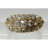 AN 18CT GOLD OLD CUT DIAMOND CLUSTER RING set with estimated approx 0.92cts of brilliant cut