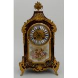 A FRENCH BOULE MANTLE CLOCK the faux tortoiseshell case with inlaid brass detail, the dial with