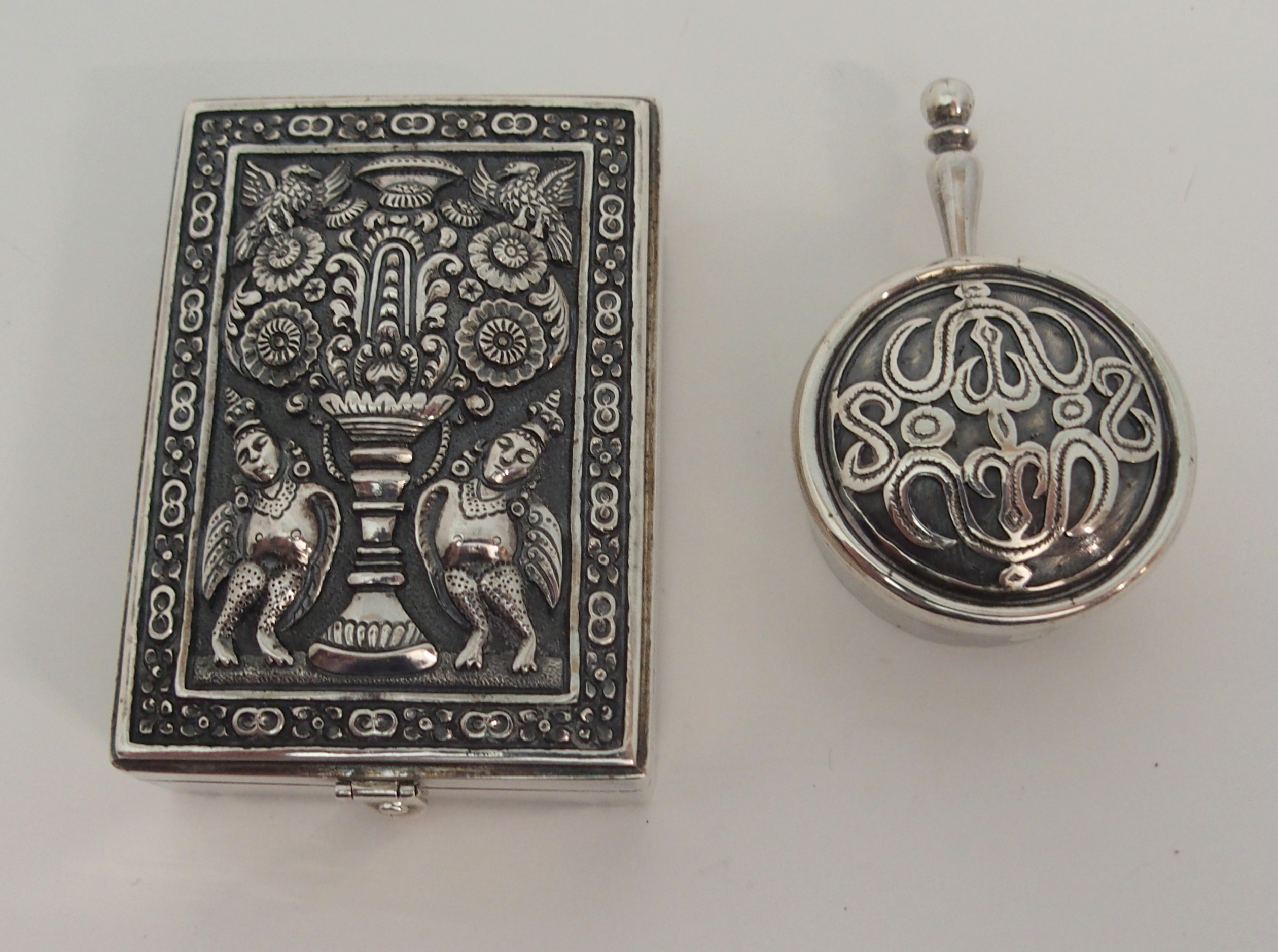 A BURMESE SILVER BOX AND COVER decorated with mythical beasts and foliage, 7 x 5cm, 119gms, oval box - Image 2 of 5