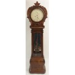 A VICTORIAN MAHOGANY DRUMHEAD LONGCASE CLOCK the foliate carved hood with enamel dial set with