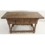 A CONTINENTAL WALNUT SIDE TABLE the single rectangular plank top above a pair of foliate and