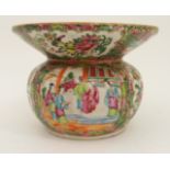 A CANTONESE SPITTOON painted with panels of figures on pavilions, birds, fruit and scattered flowers