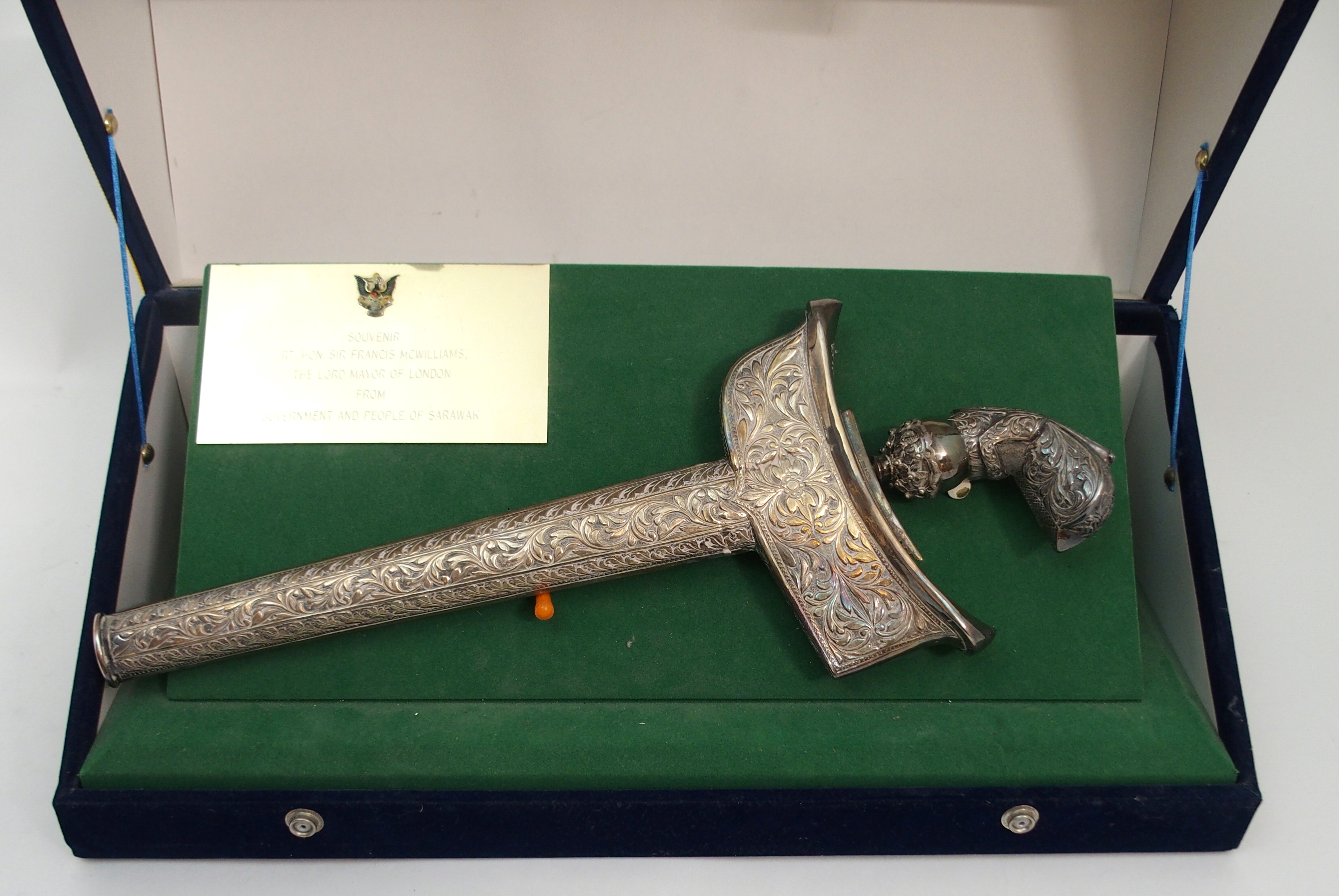 A MALAYSIAN SILVER PRESENTATION KRIS the scabbard and hilt chased with scrolling foliage, stamped