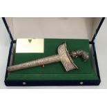 A MALAYSIAN SILVER PRESENTATION KRIS the scabbard and hilt chased with scrolling foliage, stamped
