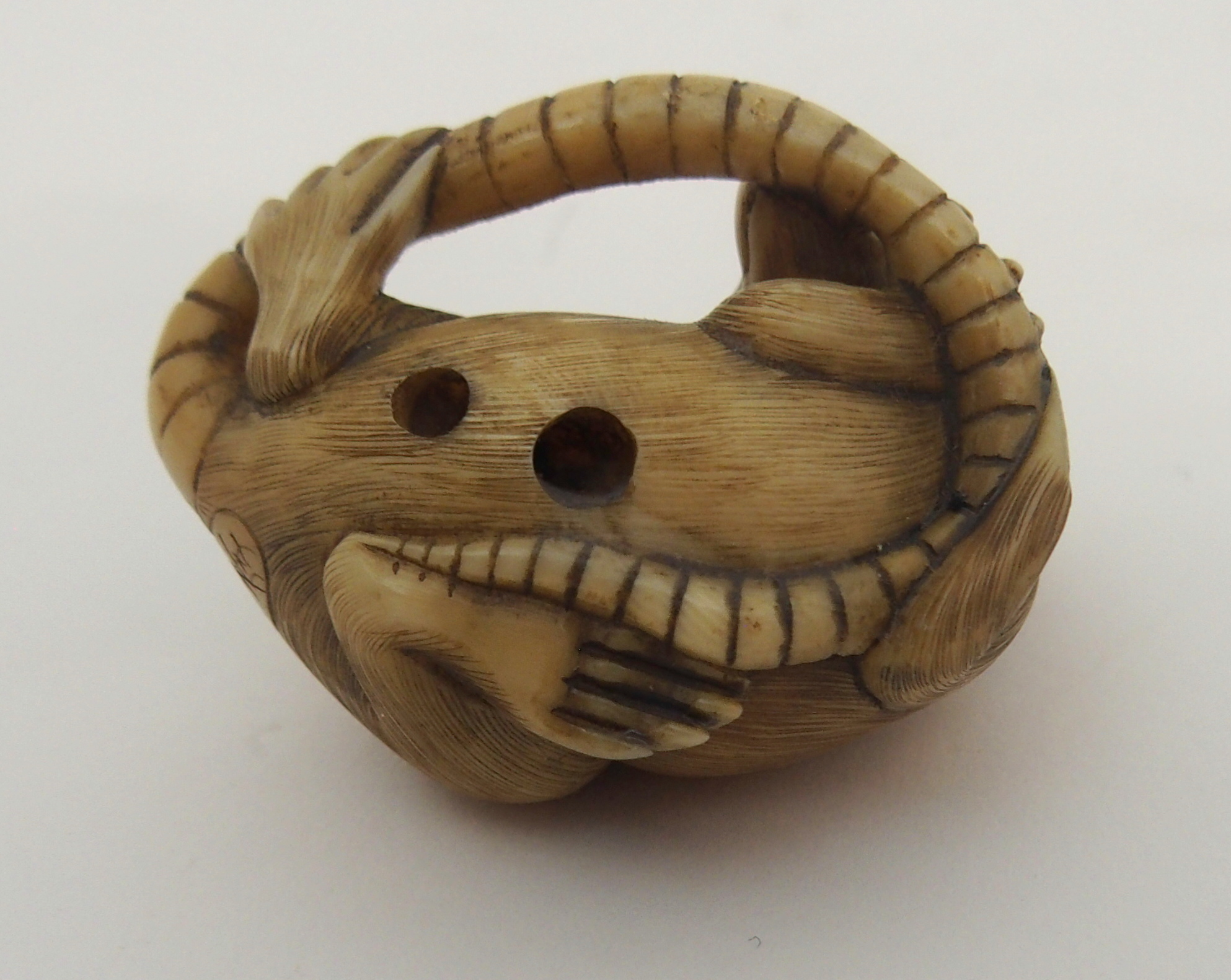 THREE JAPANESE IVORINE NETSUKE one as a rat holding a nut, signed, 3cm high, another chewing tail, - Image 5 of 7