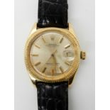 AN 18CT GOLD GENTS ROLEX OYSTER PERPETUAL DATE JUST diameter of the case approx 35mm, with black