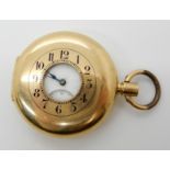 AN 18CT GOLD HALF HUNTER POCKET WATCH with white dial, subsidiary seconds dial, black Arabic
