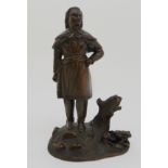 A 2OTH CENTURY BRONZE OF A NATIVE AMERICAN AND A TOAD modelled standing by a tree stump, unsigned,