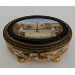 A 19TH CENTURY ITALIAN MICRO MOSAIC AND GILT METAL JEWELLERY BOX the oval lid depicting St Marks