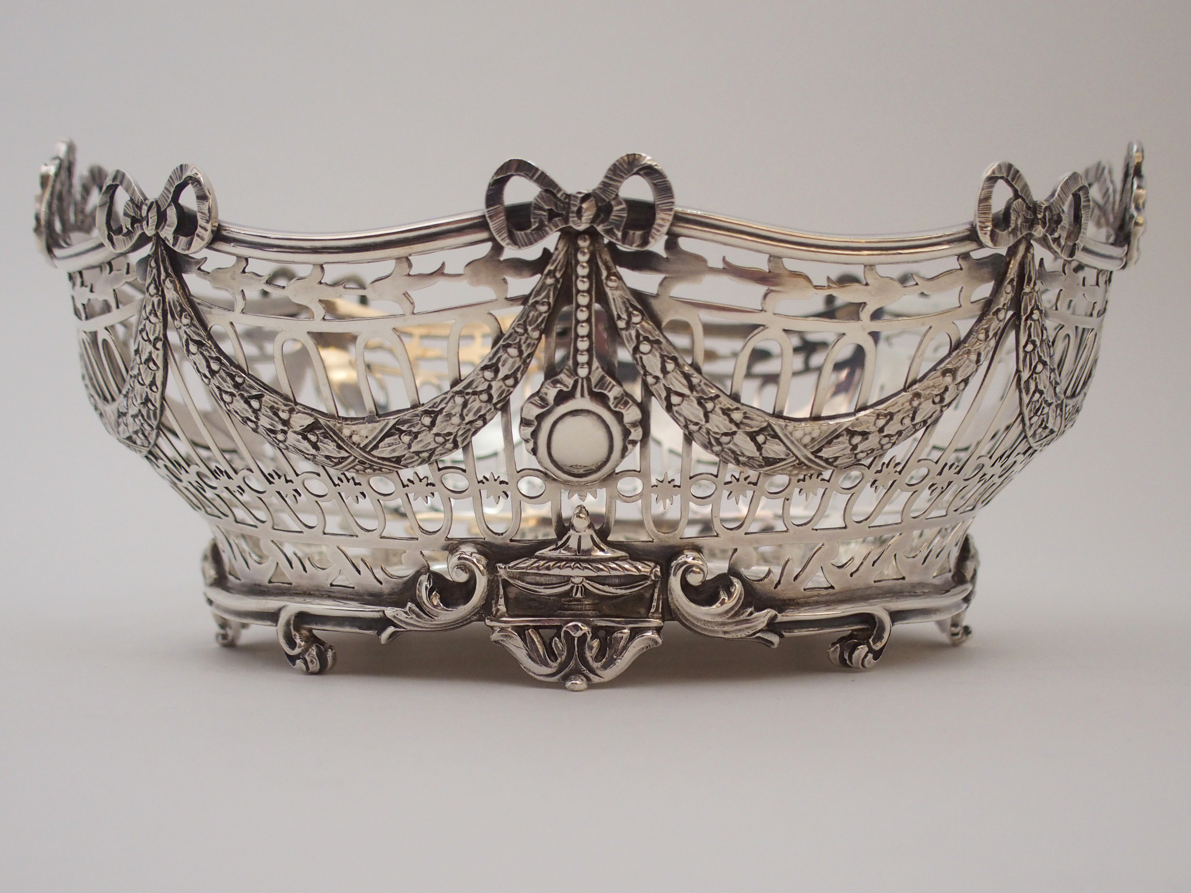 A SILVER BASKET by C. S. Harris & Sons Limited, London 1912, of oval form, the open strapwork body - Image 6 of 8