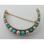 A TURQUOISE AND PEARL SET CRESCENT MOON BROOCH set throughout in yellow metal, with galleried mount,