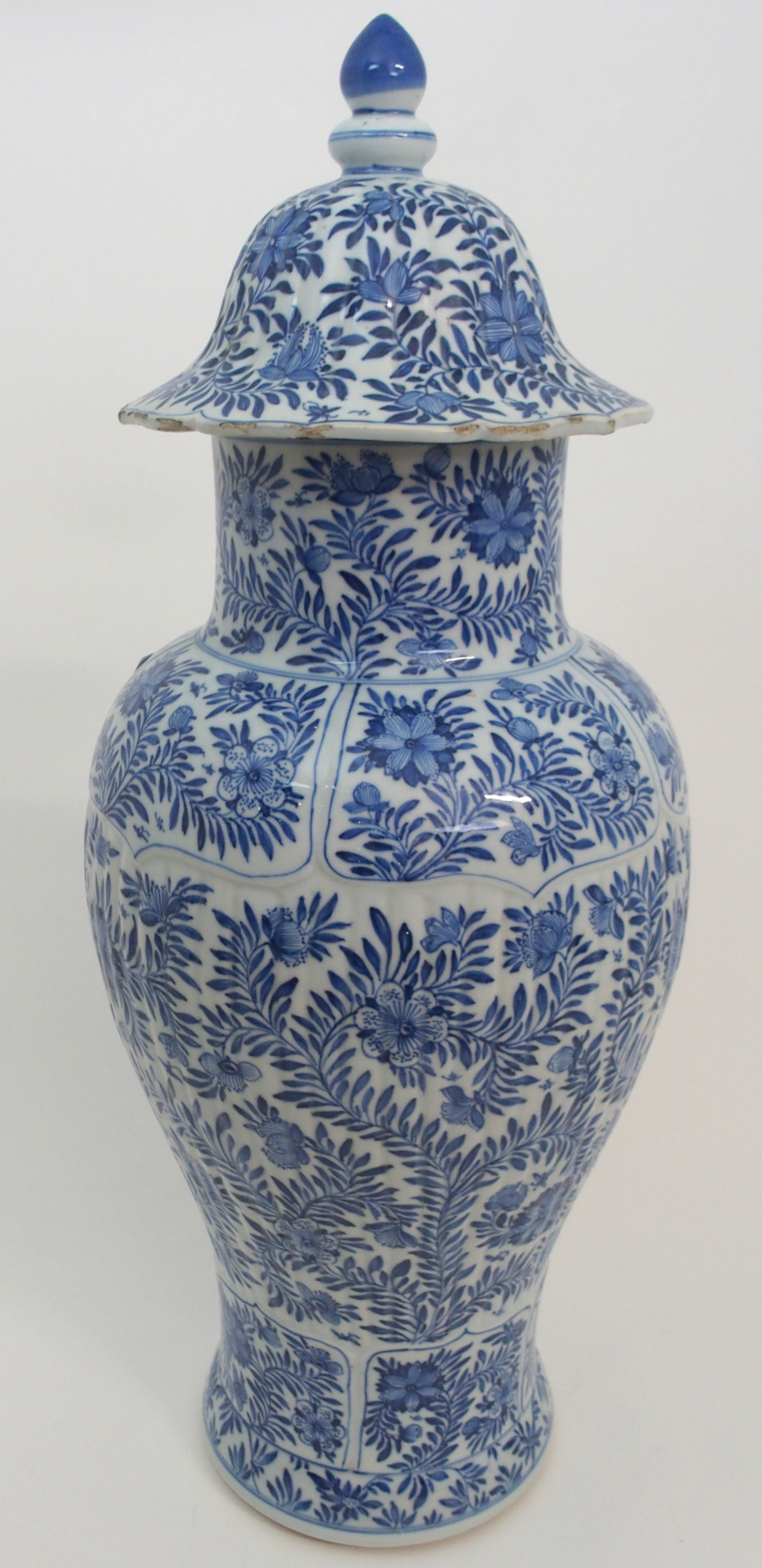 A PAIR OF CHINESE BLUE AND WHITE MOULDED BALUSTER VASES AND A COVER painted with panels of flowers - Image 12 of 12