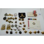 A quantity of military badges and pips and a Special Constabulary medal Condition Report:
