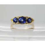 An 18ct gold sapphire and diamond ring with scrolled mount, finger size P, weight 4gms Condition