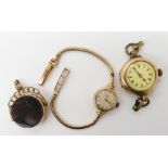 A 9ct gold ladies Girard Perregaux wristwatch, a 9ct ladies vintage watch head and a 9ct mounted